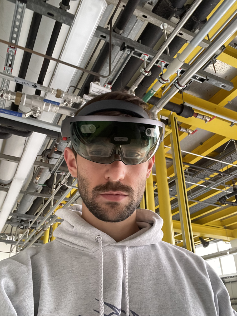 Bo Kern looking though a holo lense